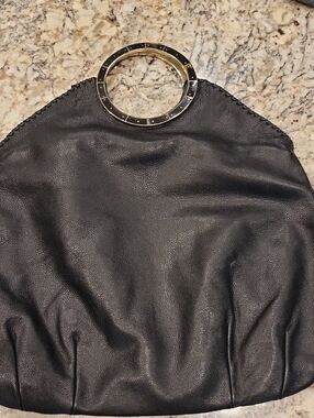 Black Pebbled Leather Handbag With Silver Ring Handles